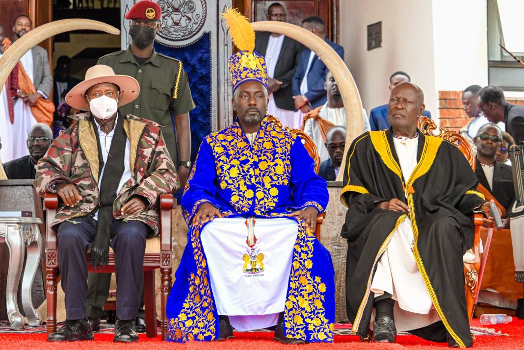 If the photo shows both seated, a more accurate caption would be: President Yoweri Museveni and Omukama Edward Rukidi Nyabongo I seated together during the coronation ceremony, as Tooro marks the beginning of a new chapter under its new king.